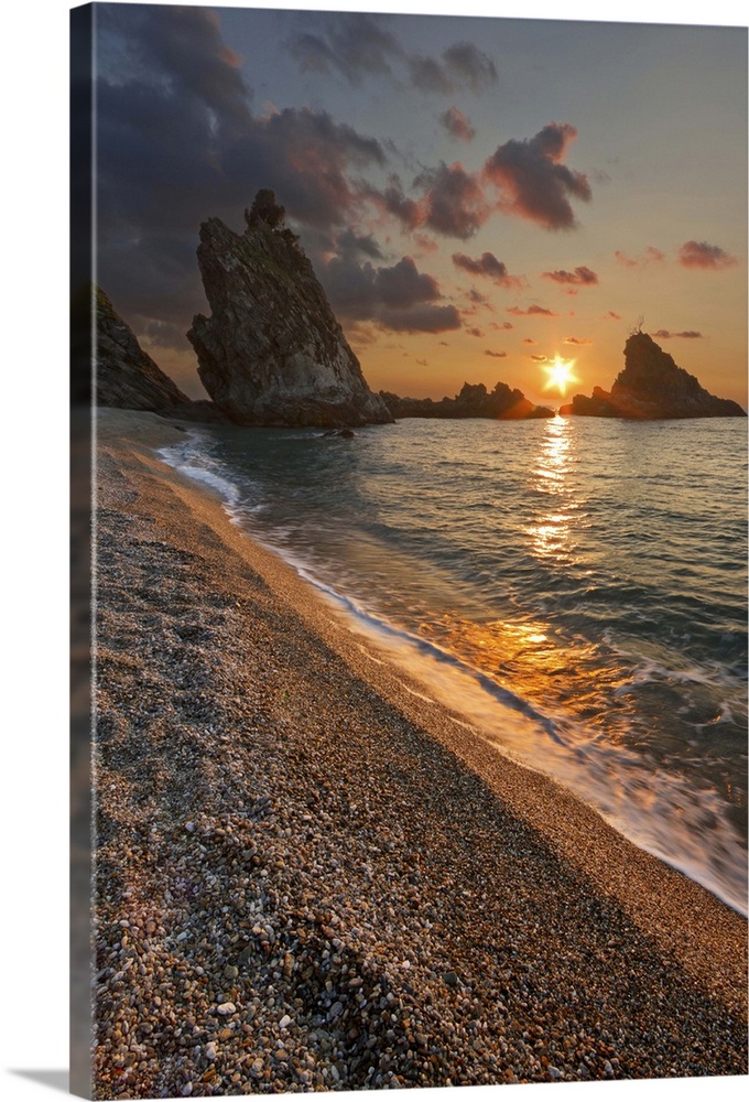 Italy, Calabria, Mediterranean sea, Reggio Calabria district, Costa Viola, Palmi, Ulivarella Rocks at sunset.
