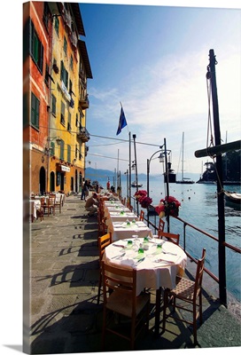 Italy, Liguria, Portofino, Tables along the harbor side