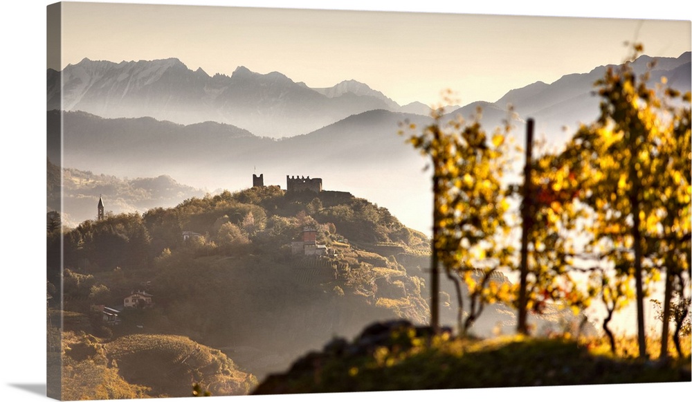 Italy, Lombardy, Sondrio district, Valtellina, Landscape with Grumello castle on top of the hill and mountains of Adamello...