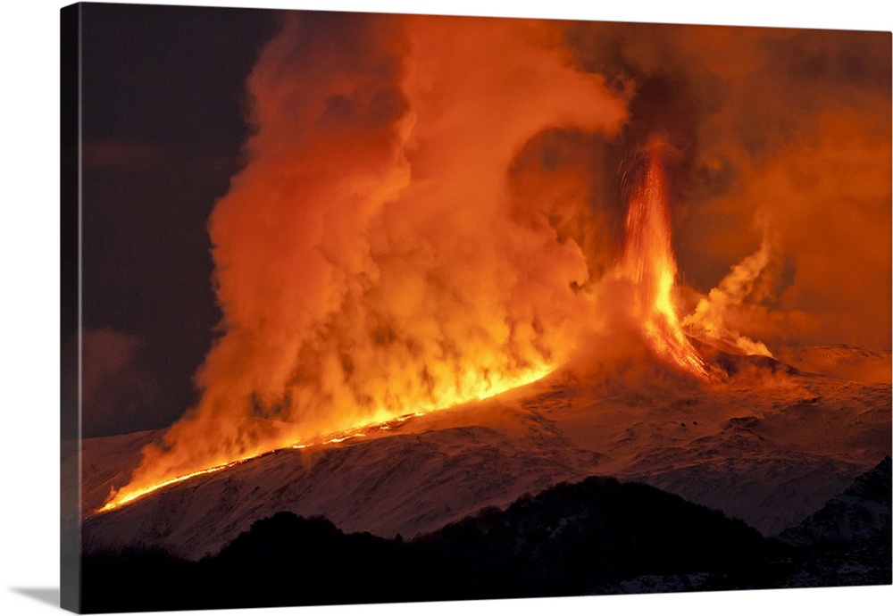 Italy, Sicily, Catania district, Mount Etna, Etna 2nd paroxysm activity of 2012, a lava flow meets snow forming huge cloud...
