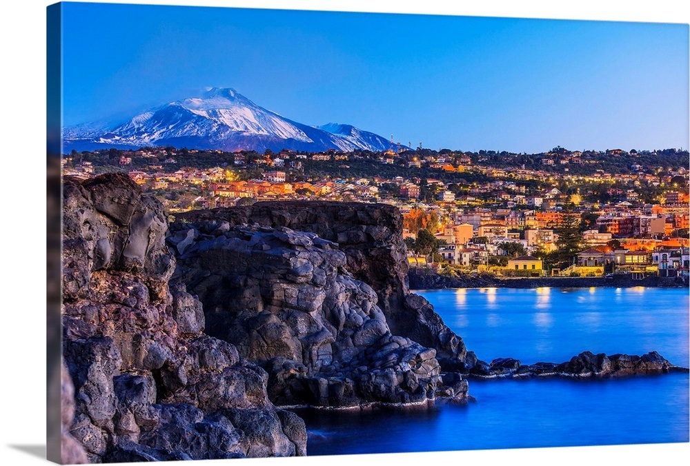 Italy, Sicily, Ognina, Mediterranean sea, Lava stone rocks with Mt Etna