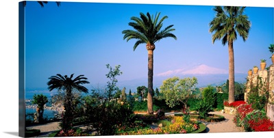 Italy, Sicily, Taormina, Garden and Mount Etna in background