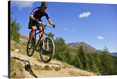 Italy, Trentino-Alto Adige, Val di Rabbi, Path to Lago Corvo refuge, mountainbiking