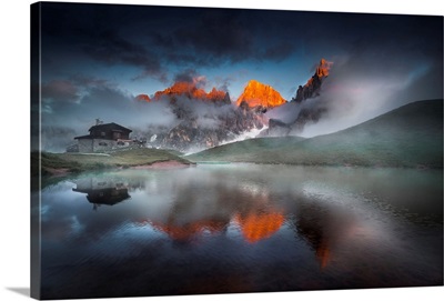Italy, Trentino, Pale Di San Martino, Reflecting On An Alpine Lake On A Cloudy Sunset