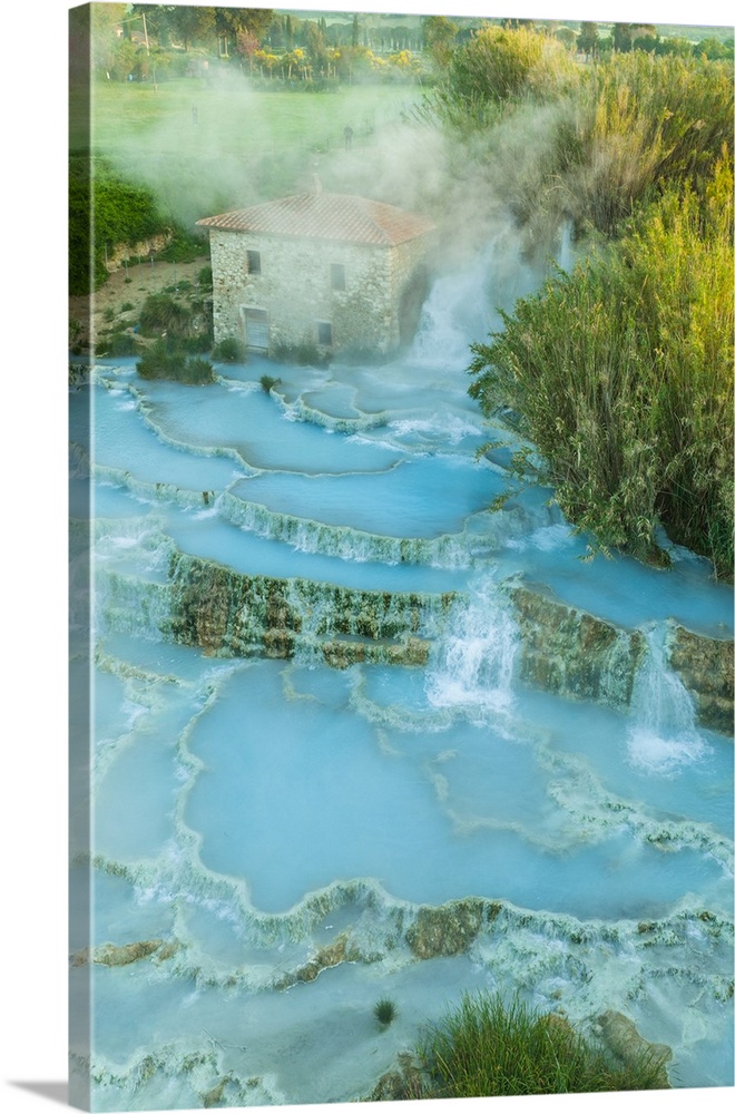 Italy, Tuscany, Grosseto district, Maremma, Saturnia, Aerial view of the thermal baths in Saturnia at sunrise.
