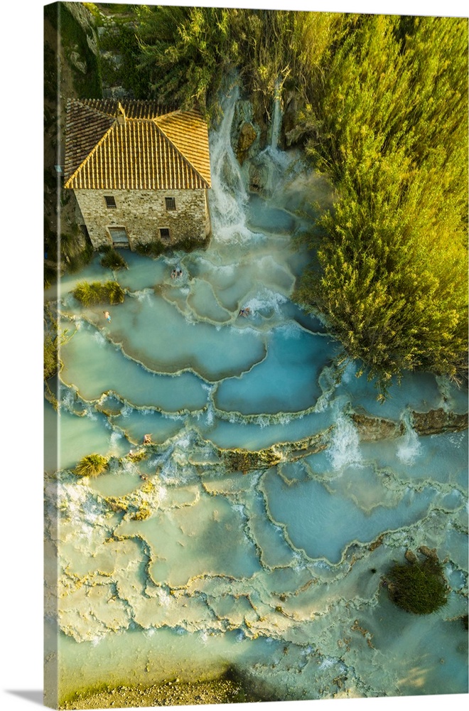 Italy, Tuscany, Grosseto district, Maremma, Saturnia, Aerial view of the amazing Saturnia thermal baths surrounded by trees.