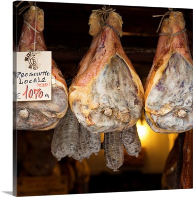 Italy, Umbria, Apennines, famous Norcia's ham exposed in one of the shops