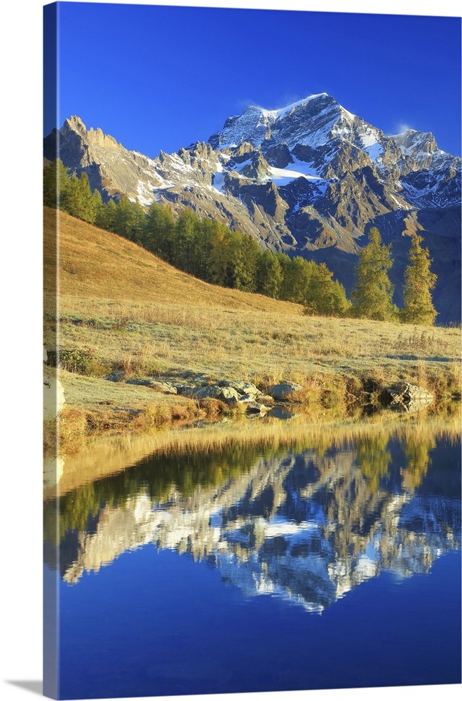 Italy, Aosta Valley, Aosta district, Valle del Gran San Bernardo, Valpelline, Alps, The Grand Combin is reflected in a sma...