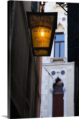 Italy, Venice, Detail of the lamp at the entrance of restaurant Da Fiore