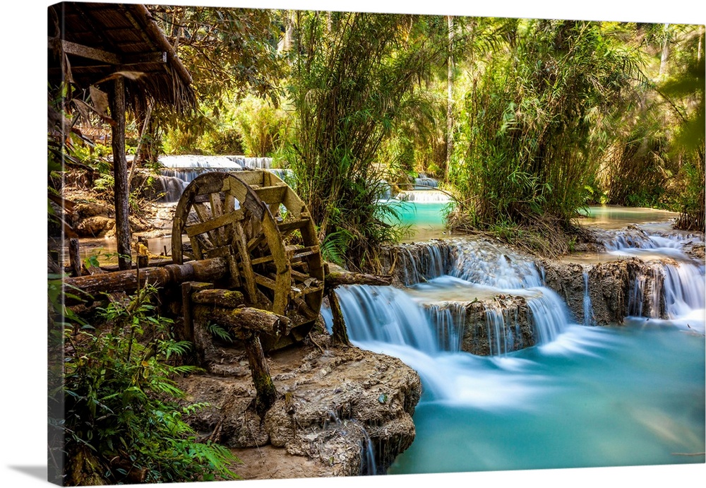 Laos, North Region, Louangphrabang, Turquoise water of the Kuang Si Waterfall and old mill.