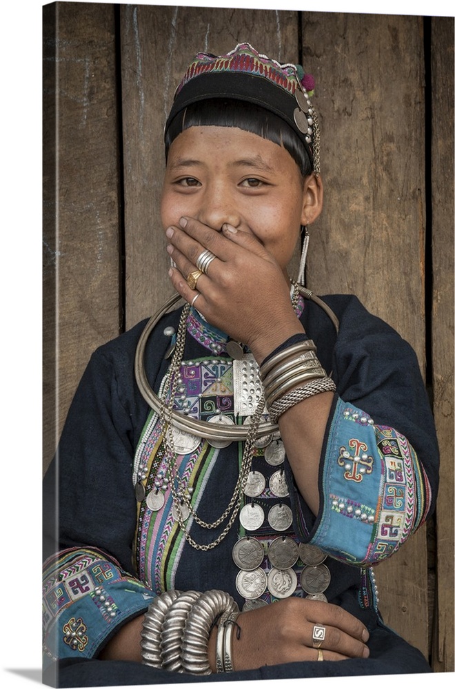 Laos, North Region, Young Akha tribes girl in traditional clothing from Phongsali province.
