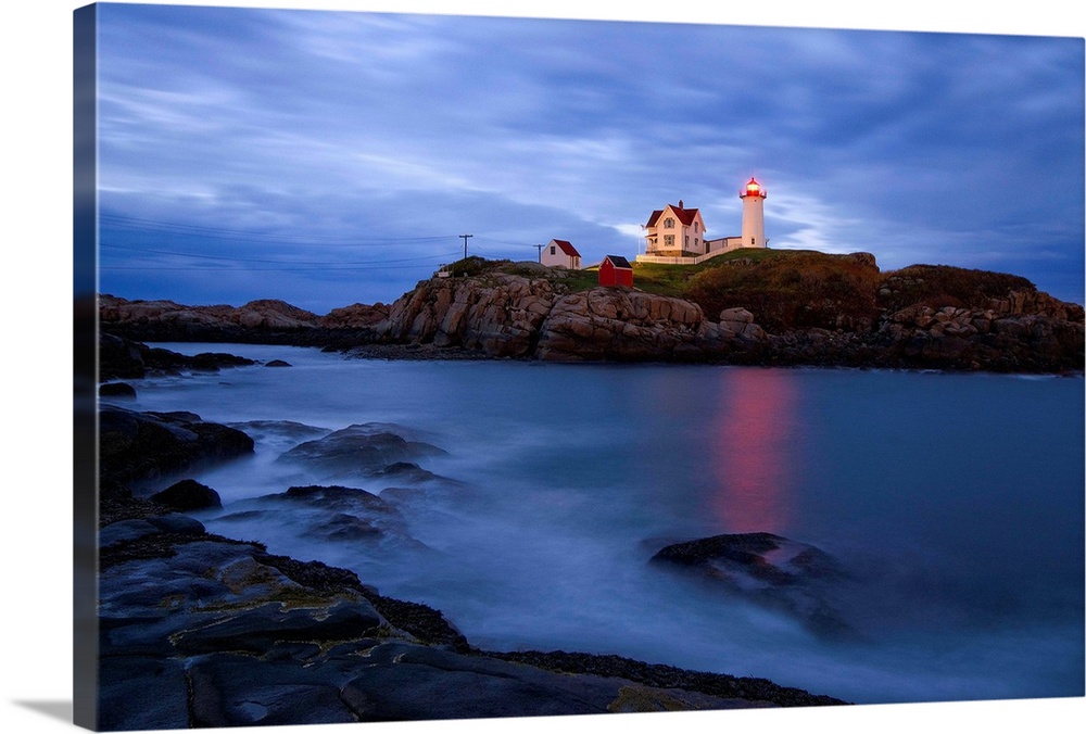 USA, Maine, Cape Neddick, York Beach, the lighthouse at dusk.