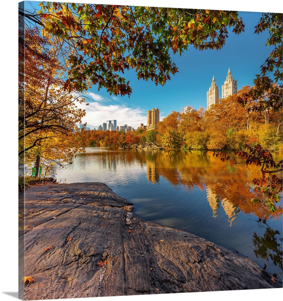 USA, New York City, Manhattan, Central Park, Lake and San Remo apartment building in the foliage
