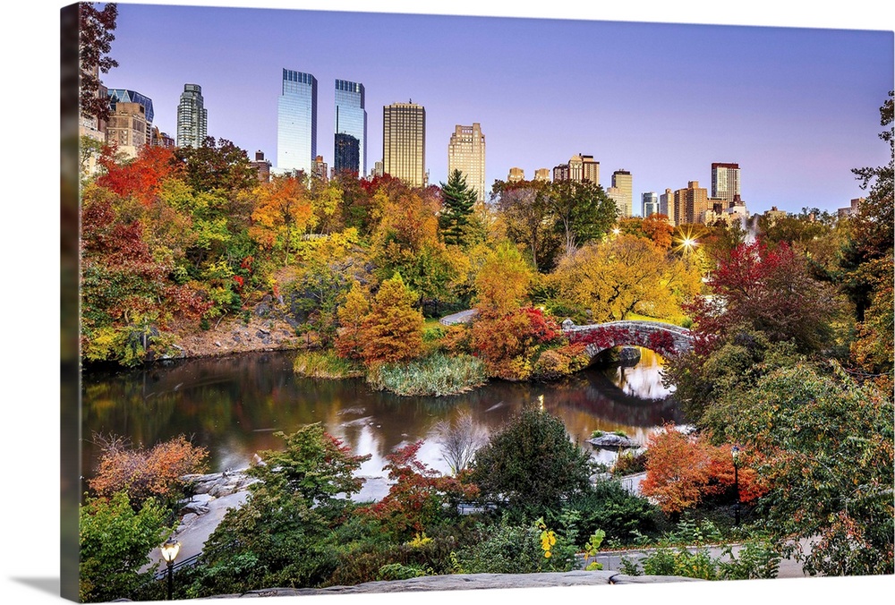USA, New York City, Manhattan, Central Park, Midtown skyline and Gapstow Bridge during the foliage