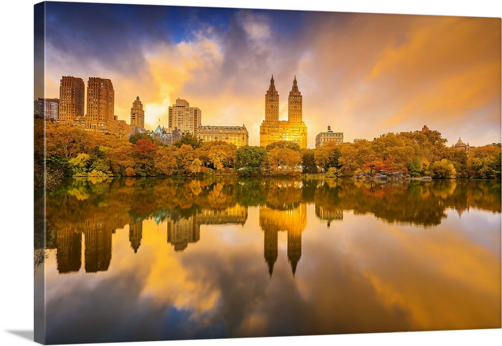 USA, New York City, Manhattan, Central Park, The lake and San Remo apartment building, foliage