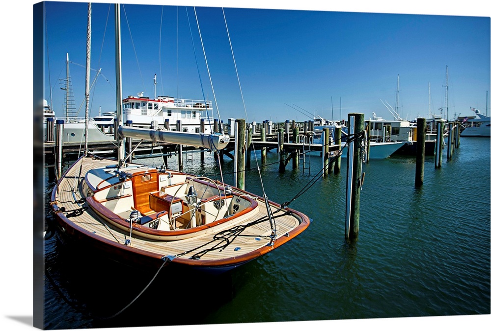 Massachusetts, Nantucket, docked wooden boat at Nantucket harbor