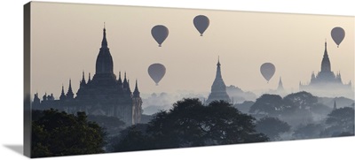 Myanmar, Hot air balloons flying over the Buddhist temples in the plain of Bagan