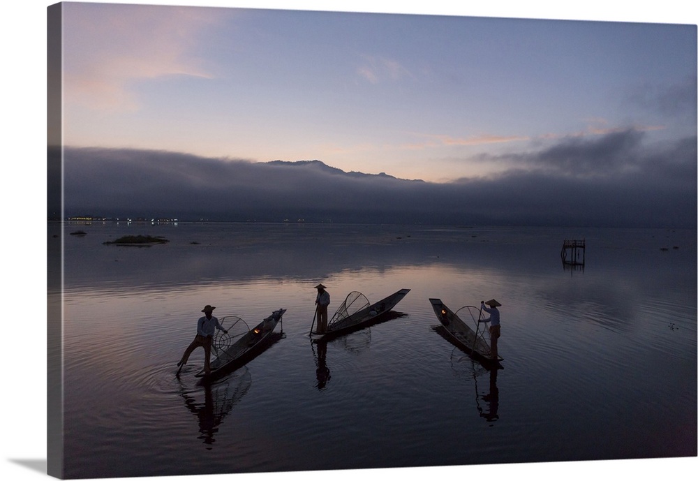 Myanmar, Shan, Inle Lake, Nyaungshwe, Three fishermen with tea fires in their boats