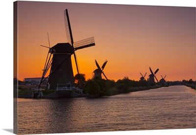 Netherlands, Benelux, Kinderdijk, Windmills at sunset