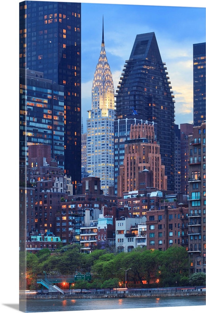 USA, New York City, Manhattan, Midtown, Chrysler Building, View towards Manhattan at dusk from Roosevelt Island.
