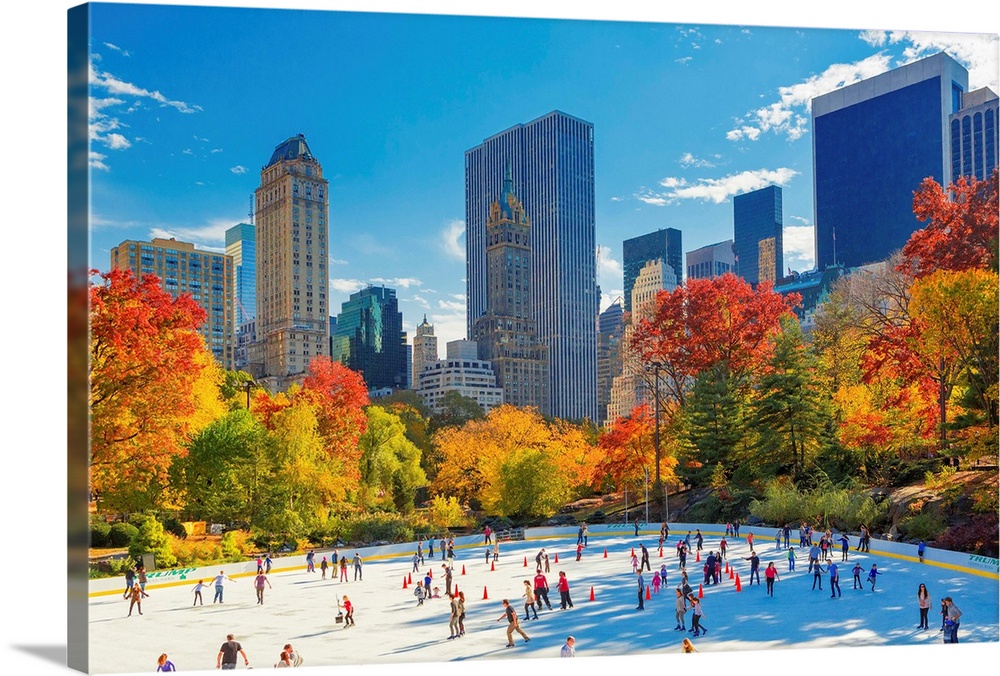 USA, New York City, Manhattan, Central Park, Wollman Rink, Ice rink, Fifth Avenue skyline in the background.