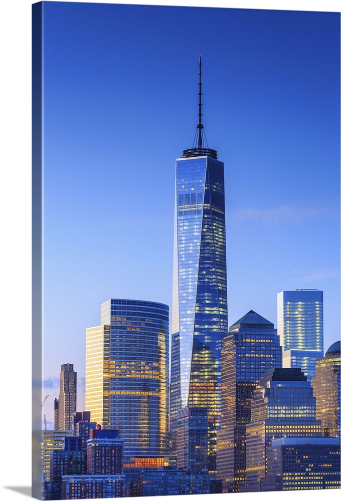 USA, New York City, Manhattan, Lower Manhattan, One World Trade Center, Freedom Tower, Lower Manhattan buildings illuminat...
