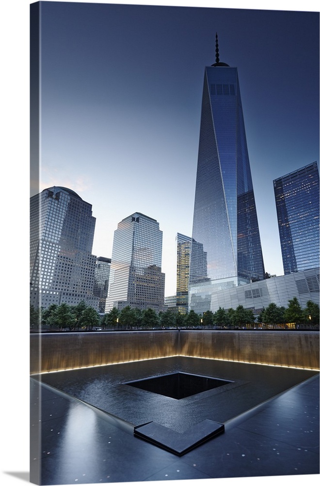 USA, New York City, Manhattan, Lower Manhattan, One World Trade Center, Freedom Tower, Ground Zero memorial at the site of...