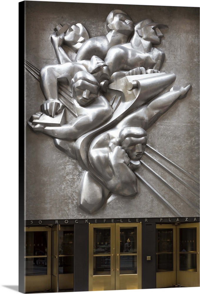 USA, New York City, Manhattan, Midtown, Rockefeller Center, The 'News' relief sculpture by Isamu Noguchi over the building...