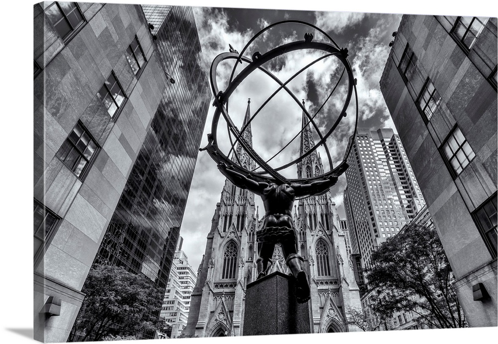 New York City, Manhattan, Midtown, Rockefeller Center's Atlas sculpture facing Saint Patrick's Cathedral.