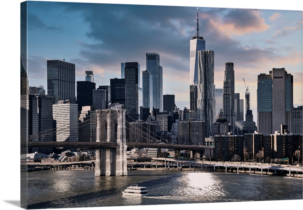 New York City, East River Scene with Lower East Side skyline viewed from Manhattan Bridge.