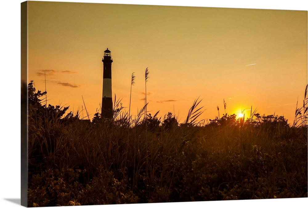 New York, Long Island, Fire Island Lighthouse at sunset.
