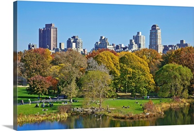 New York, New York City, Central Park, Skyline with Turtle Pond in the foreground