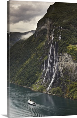 Norway, Passenger ferry on the Geirangerfjord at the Seven Sisters Waterfall