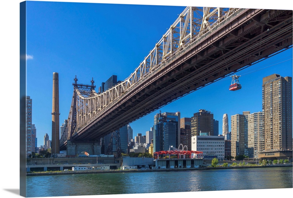 New York, NYC, Manhattan, City skyline, Queensboro Bridge, and Roosevelt Island Tram viewed from Roosevelt Island.
