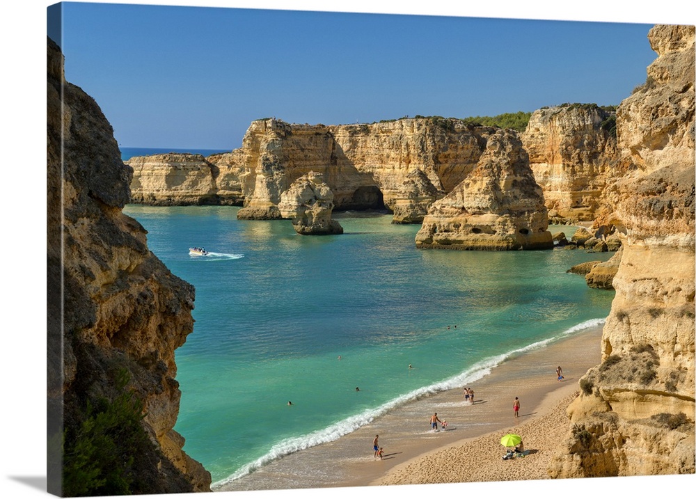 Portugal, Faro, Armacao de Pera, Algarve, Praia da Marinha, Praia da Marinha beach and rock formations on  coast with few ...