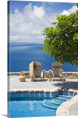 Saint Lucia, Gros Islet, Chairs at the poolside facing to sea, Mount du Cap