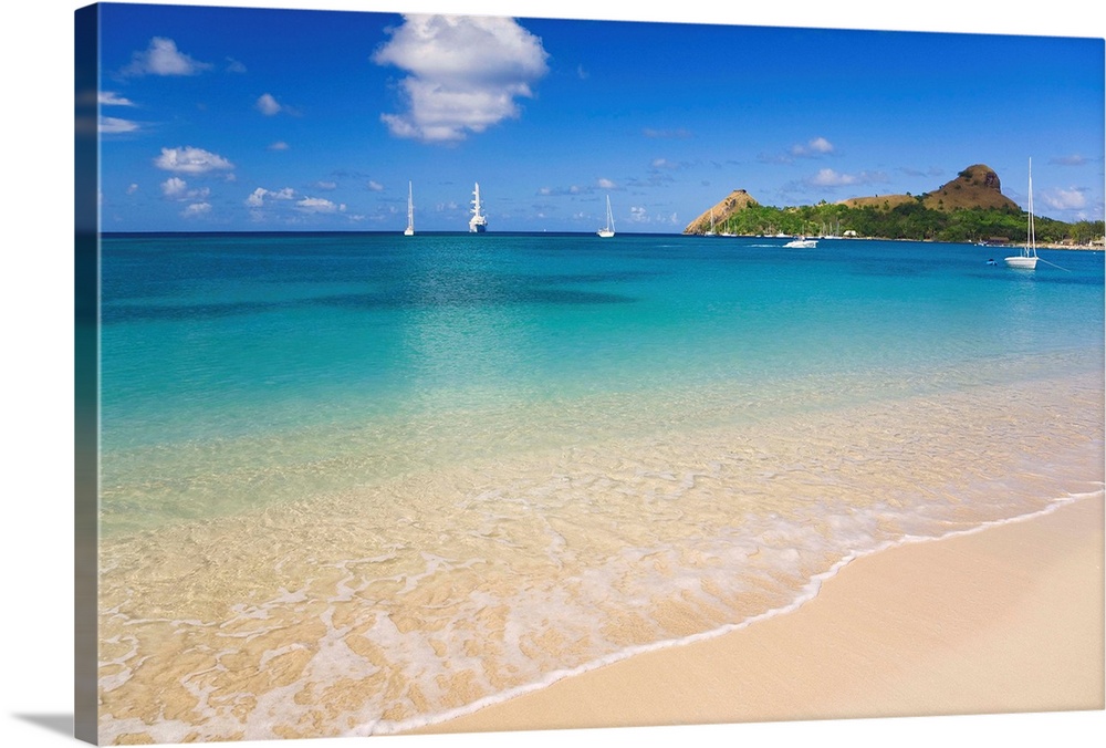 Saint Lucia, Gros Islet, Rodney Bay, Reduit Beach with Pigeon Island in background.