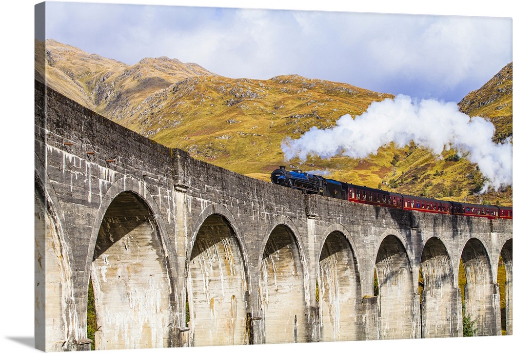 Scotland, Highland, Glenfinnan, Great Britain, British Isles, The Jacobite steam train on the Glenfinnan viaduct which ins...