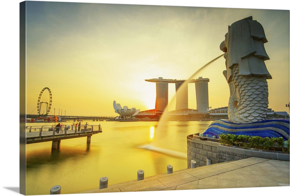 Singapore, Singapore City, Merlion fountain at dawn, Marina Bay Sands in the background.