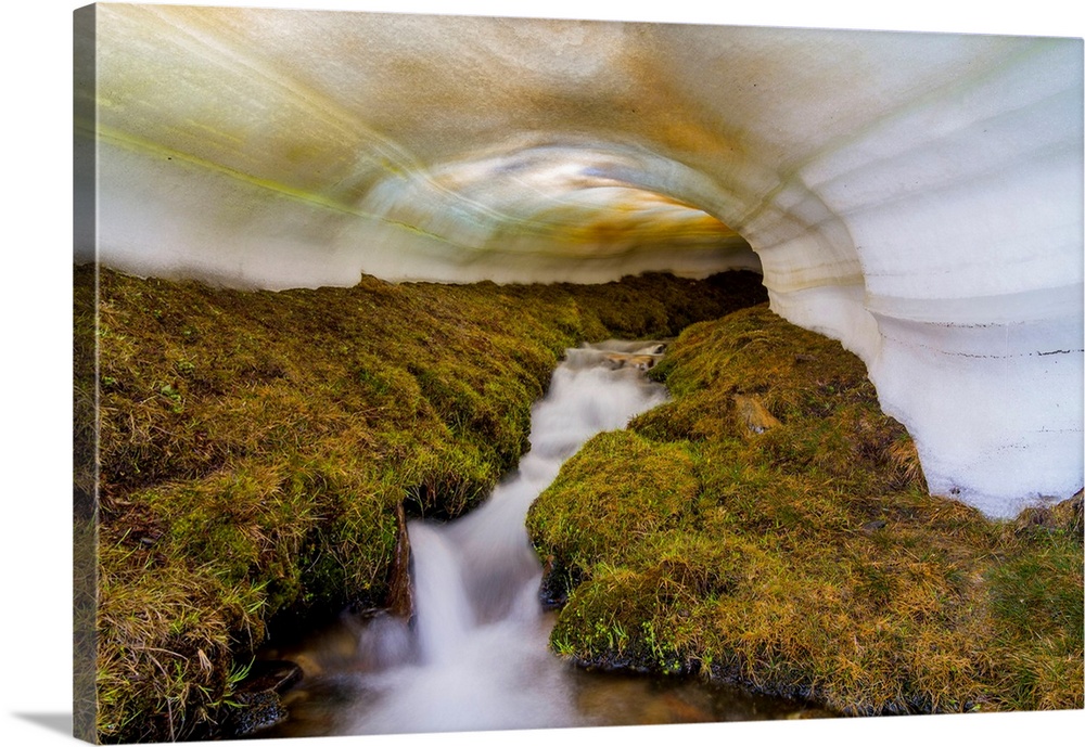 Spain, Andalusia, Sierra Nevada National Park, A snow tunnel in Lavaderos de la Reina during the spring melting period.