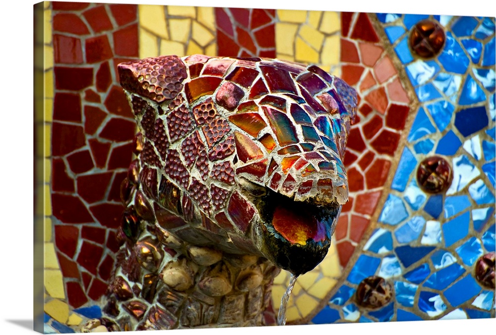 Spain, Barcelona, Park Guell, Mosaic Dog decorating entrance.