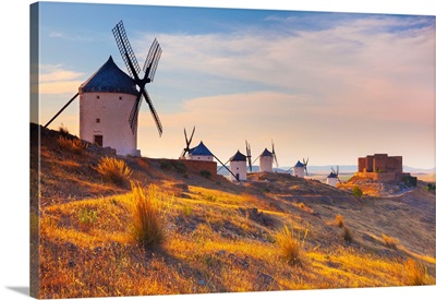 Spain, Castilla-La Mancha, Consuegra, Windmills And The Castle Near The Village, Sunrise