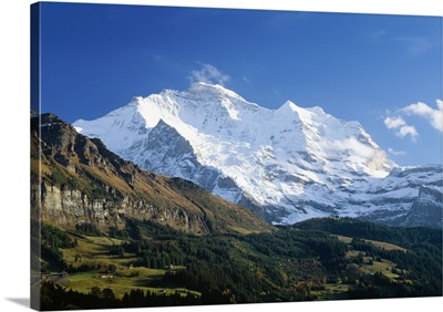Switzerland, Bern, View towards Wengen village, Eiger, Monch and Jungfrau mountains