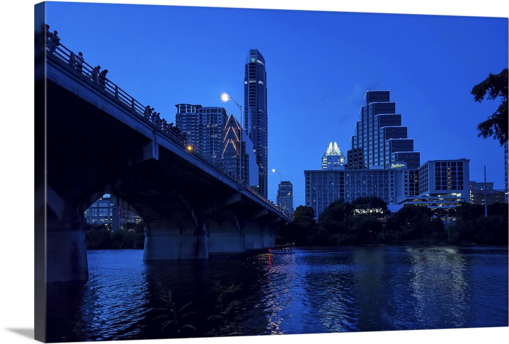 Texas, Austin, Congress Avenue bridge looking toward Texas State Capital and downtown at dusk