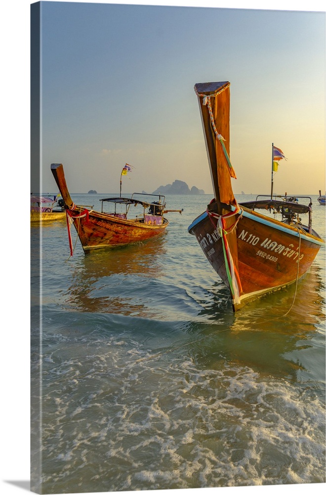 Thailand, Thailand Southern, Krabi, Andaman sea, Indian ocean, Typical Thai boat on the seaside of Ao Nang beach at sunset