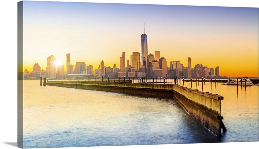 USA, New Jersey, Lower Manhattan skyline with One World Trade Center and Freedom Tower at sunrise
