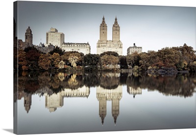 USA, New York City, Central Park, The Lake And San Remo Apartment Building, Foliage