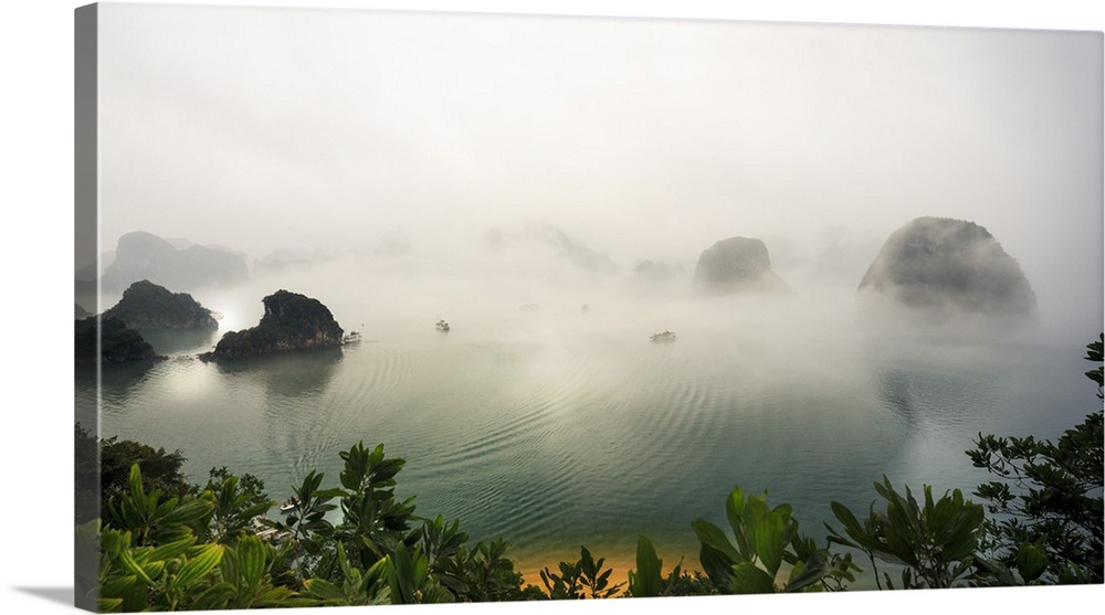 Vietnam, Northeast, Halong Bay, Mist above waters of Halong Bay.