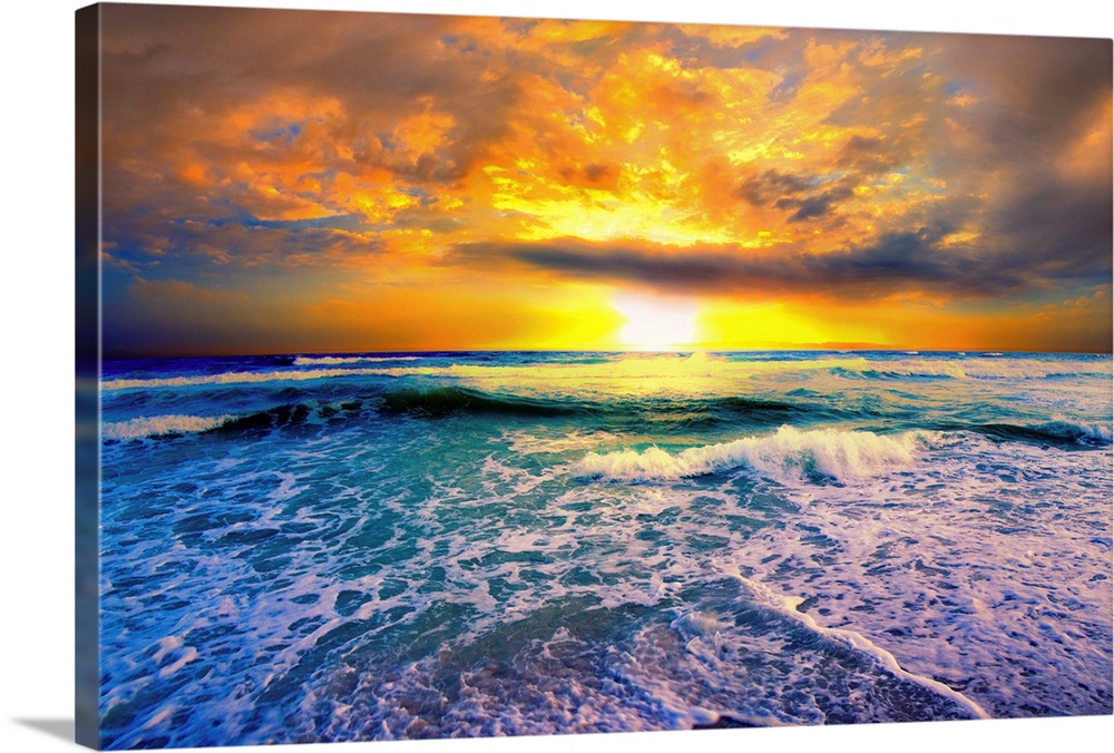 A golden sunset on the beach in this beautiful landscape picture. This picture of a beautiful beach sunset features a brig...