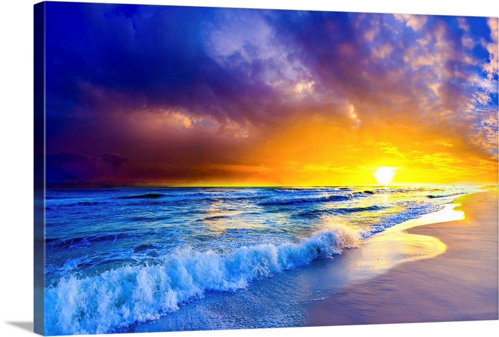A beautiful Orange and Purple Ocean Sunset. A line of sun kissed waves lead your eye to the horizon where a bright range s...